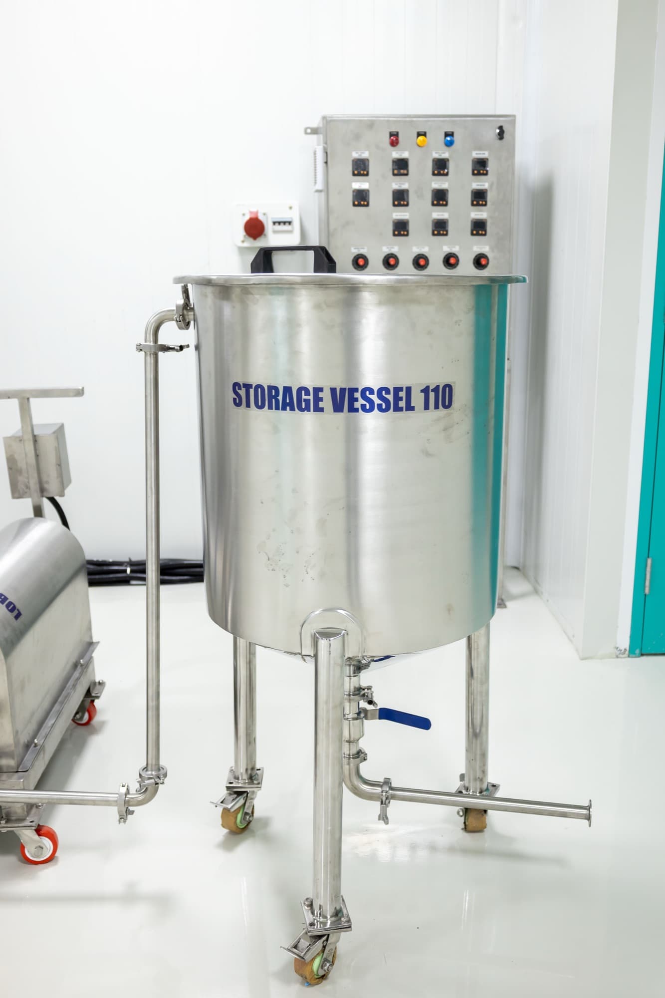 Stainless-steel storage vessel with control panel